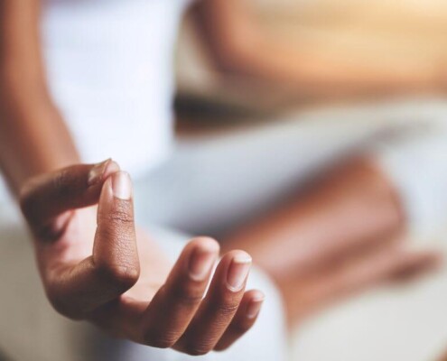 Closeup of woman in a lotus position
