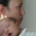 An exhausted-looking new mom holds a sleeping baby on her chest. Motherhood doesn't have to strip you from your identity. Discover how postpartum depression therapy in Haddonfield, NJ can help you find yourself.