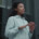 A woman stands outdoors with her eyes closed, taking a deep breath while holding her hands in a relaxed, grounding position. Representing how ADHD therapy in Medford, NJ can help you feel more grounded with executive functioning skills. Learn more here.