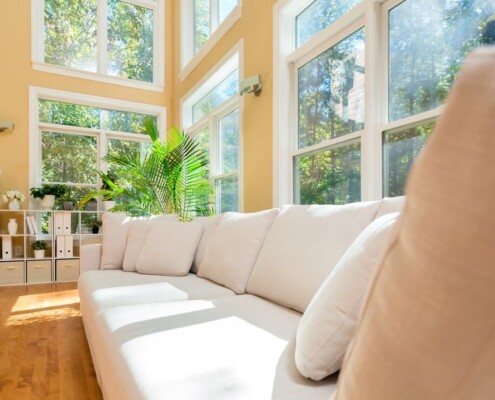 Serene, light-filled counseling office interior with natural light and a comfortable seating area.
